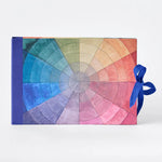 RoomyTown Color Wheel Artist Sketchbook with a rainbow color wheel cover and blue ribbon tie