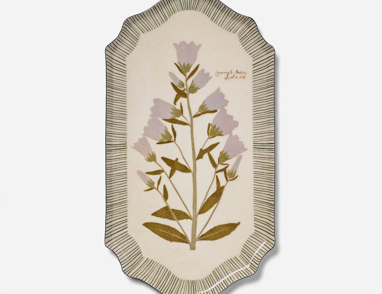 RoomyTown Enamel Tray in Campanula Bellflower, a cream oval tray with a pressed purple flower print