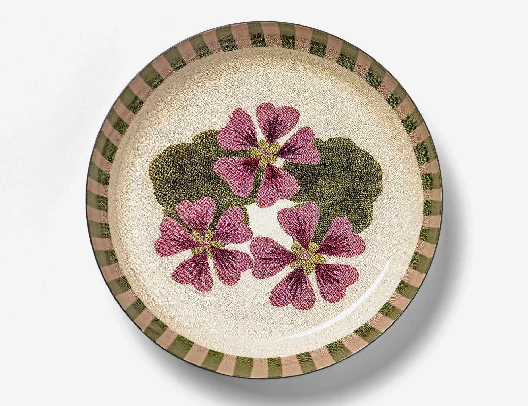 RoomyTown Enamel Tray in Geranium, a round tray with pressed pink flowers and a green striped rim