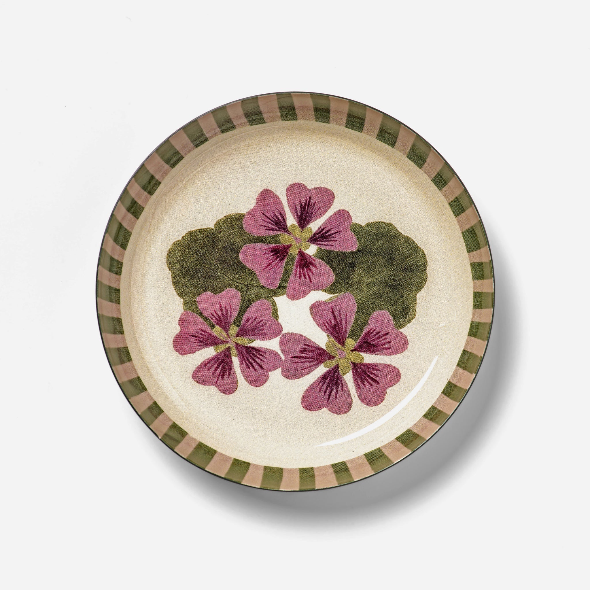 RoomyTown Enamel Tray in Geranium, a round tray with pressed pink flowers and a green striped rim