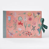 RoomyTown Festival of Flowers Artist Sketchbook with a pink botanical cover and green ribbon tie
