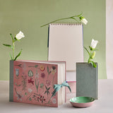 RoomyTown Festival of Flowers Artist Sketchbook styled with flowers and a green sketchbook