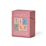 Back of the RoomyTown Festival of Flowers Playing Cards Set of 2 box with a product description