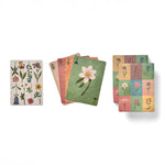 RoomyTown Festival of Flowers Playing Cards from both decks laid out in green and pink