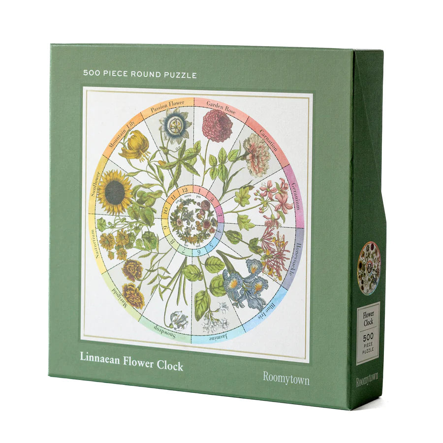 RoomyTown Flower Clock 500-Piece Round Jigsaw Puzzle box shown at an angle