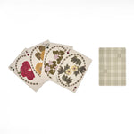 RoomyTown The Living Herbarium Playing Cards fanned out showing pressed flower face cards and a gingham back