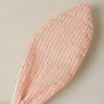 Close-up of the pink textured fabric ear on the Rylee & Cru Bunny Headband in Petal