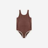 Rylee & Cru Chocolate Moxie One-Piece, a brown ribbed girls swimsuit with cream trim, laid flat