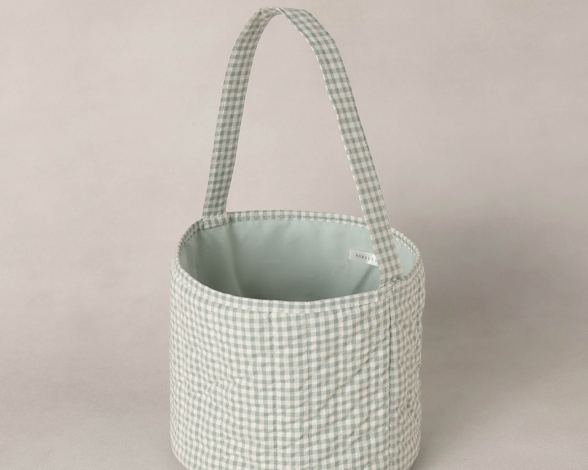 Rylee & Cru Easter Basket in Eucalyptus Check, front view showing the sage lining