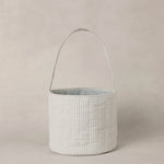 Rylee & Cru Easter Basket in Sky Stripe, a soft blue and white striped fabric basket with a handle