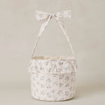 Rylee & Cru Easter Basket in Summer Ditsy, a cream floral fabric basket with a ruffle and bow handle