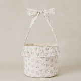 Rylee & Cru Easter Basket in Summer Ditsy, a cream floral fabric basket with a ruffle and bow handle