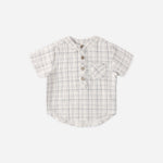 Rylee & Cru Jaxson Shirt in Blue Plaid, a cream and blue plaid short-sleeve henley with wooden buttons, laid flat