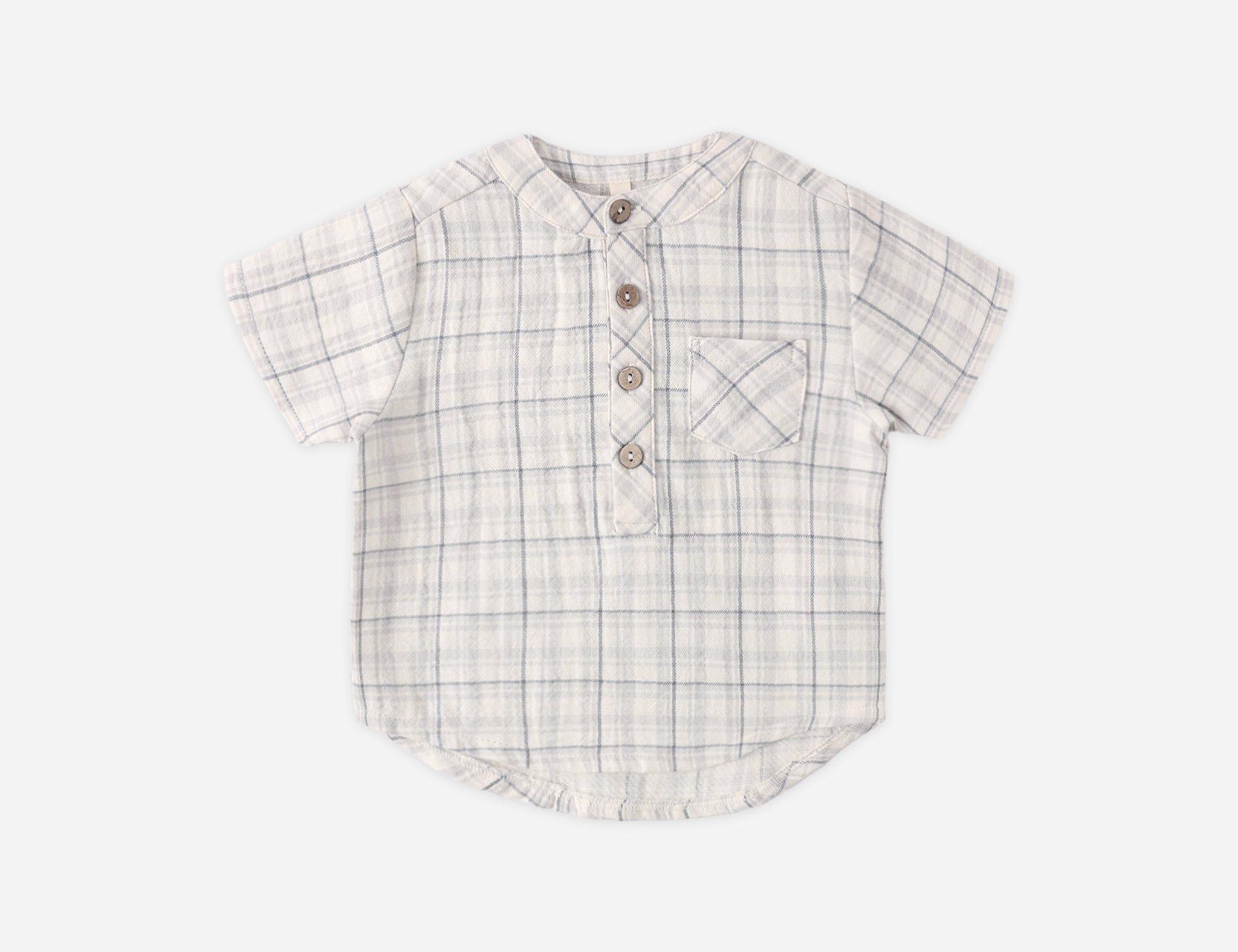 Rylee & Cru Jaxson Shirt in Blue Plaid, a cream and blue plaid short-sleeve henley with wooden buttons, laid flat