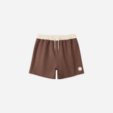 Rylee & Cru Paneled Boardshort in Chocolate, brown swim shorts with a cream waistband, laid flat