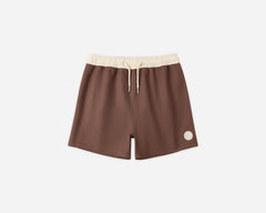 Rylee & Cru Paneled Boardshort in Chocolate, brown swim shorts with a cream waistband, laid flat
