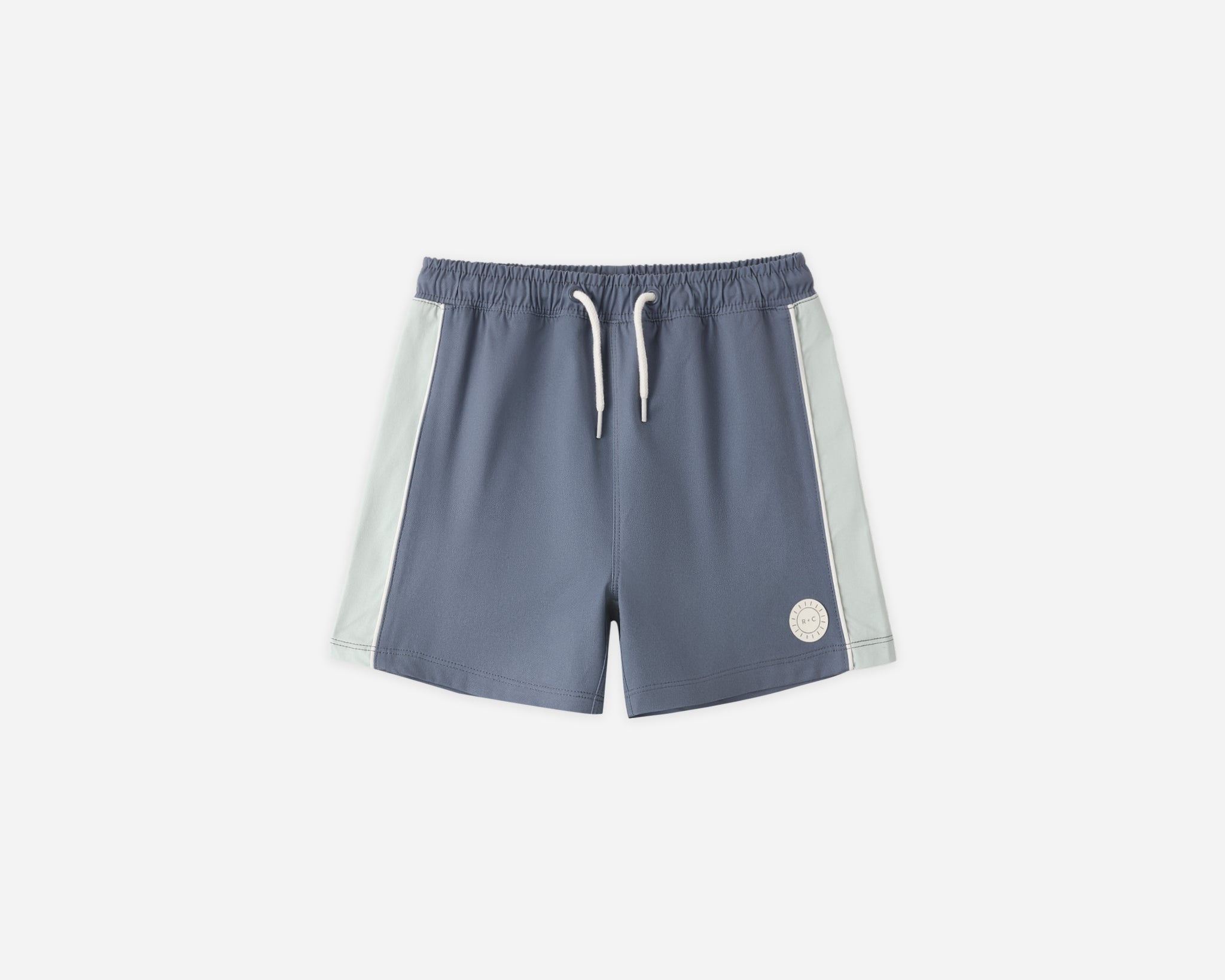 Rylee & Cru Paneled Boardshort in Marine, slate blue swim shorts with light blue side panels, laid flat