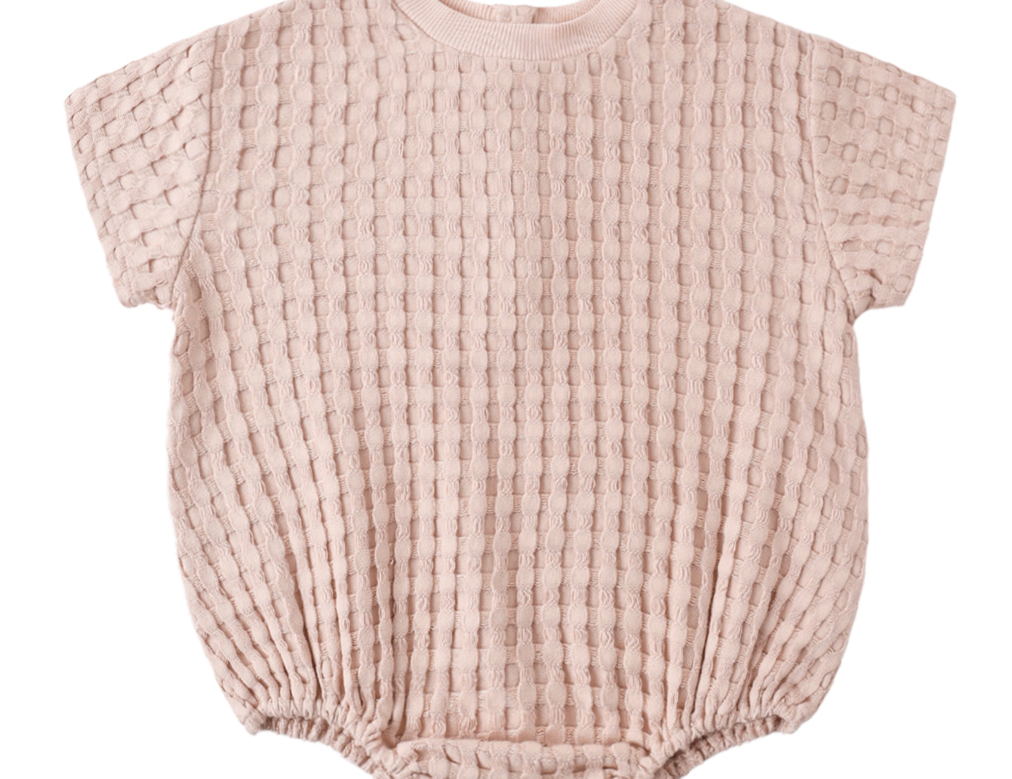 Rylee & Cru Relaxed Bubble Romper in Blush, a pale pink waffle-knit baby romper, laid flat