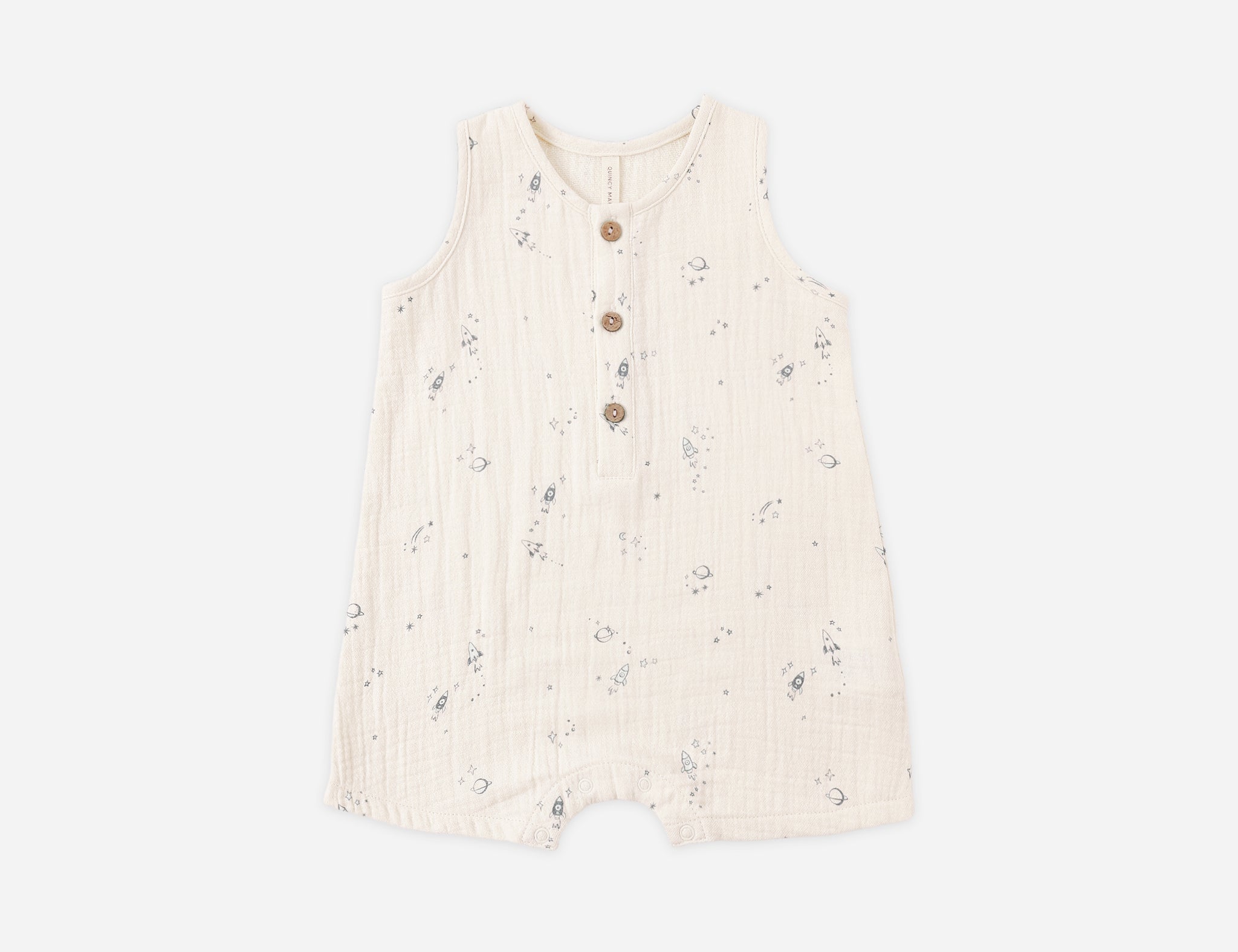 Rylee & Cru Romper in Space, a cream sleeveless gauze baby romper with a small rocket and planet print