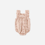 Rylee & Cru Ruffle Romper in Cherries, a blush pink baby romper with a cherry print and ruffle sleeves