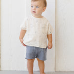 Toddler in a cream printed tee wearing the Rylee & Cru Utility Short in Ocean