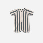 Rylee & Cru Zip Rashguard One-Piece in Retro Ocean Stripe, a navy and cream striped short-sleeve baby swimsuit with a front zipper