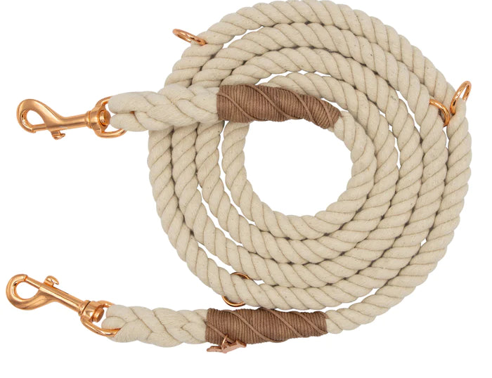 Sassy Woof Hands Free Rope Leash in Natural, a cream cotton rope leash with leather accents and rose gold clips