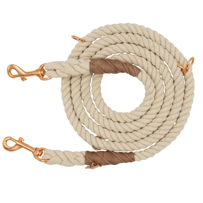Sassy Woof Hands Free Rope Leash in Natural, a cream cotton rope leash with leather accents and rose gold clips