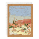 Seedlings Saguaros Love + Friendship Card, a painted desert landscape with saguaros reading Wish you were here