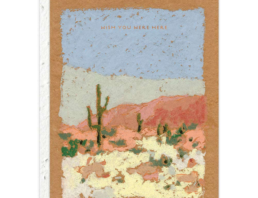 Seedlings Saguaros Love + Friendship Card, a painted desert landscape with saguaros reading Wish you were here