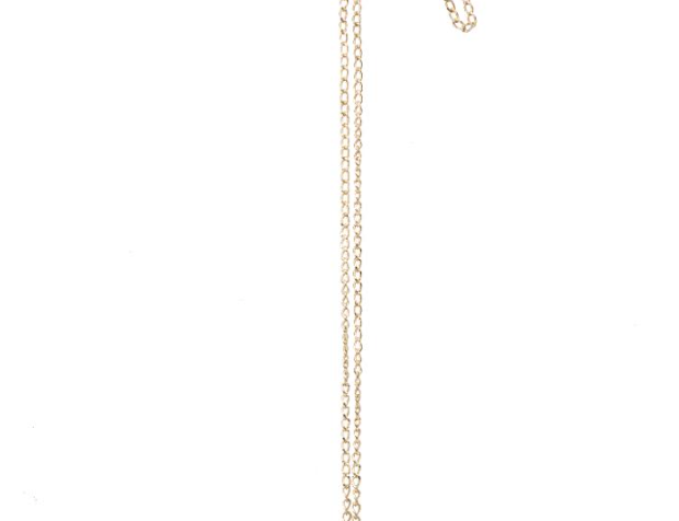Sibilia Pollen Pendant Necklace, a long thin gold chain with a small textured gold drop pendant