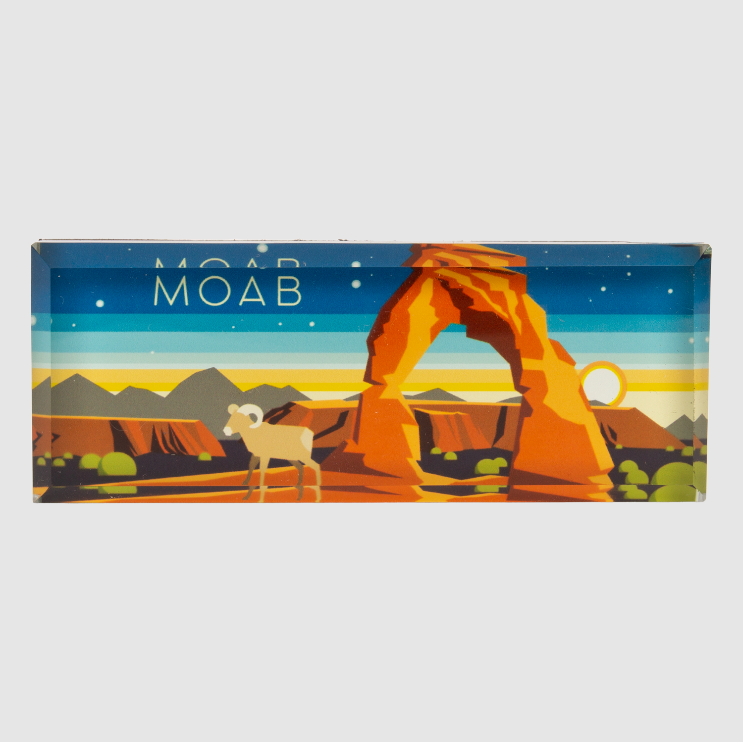 Glass Moab magnet with Delicate Arch in orange under a layered sunset sky and a bighorn sheep