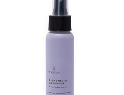 Skeem Citronella Travel Body Spray in a lavender purple bottle with a black spray top