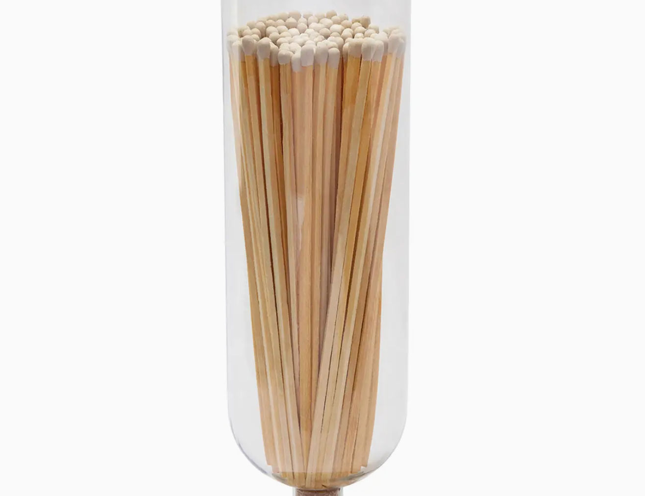 Skeem Fireplace Match Cloche, a tall glass cloche filled with long matches on a metal base