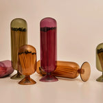 Skeem Match Cloches in amber, plum, olive and blush grouped together
