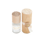 Skeem Print Block Perfume in Vintage Peony, a small rollerball bottle beside its carved wooden print block case