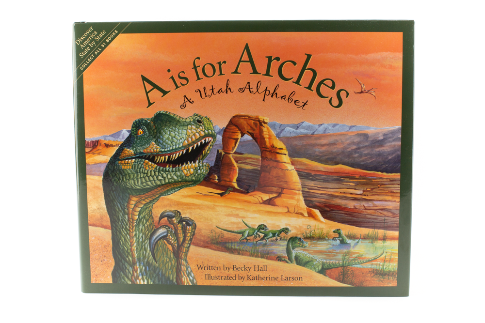 A is for Arches: A Utah Alphabet book by Sleeping Bear Press, cover with a dinosaur and Delicate Arch illustration