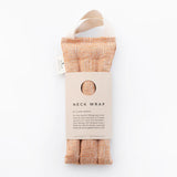 Slow North Hot + Cold Neck Wrap in Copper Fields, a terracotta crosshatch wrap with a kraft Neck Wrap sleeve