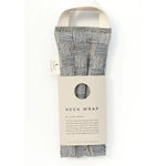 Slow North Hot + Cold Neck Wrap in Haystack, a navy and cream crosshatch wrap with a kraft Neck Wrap sleeve