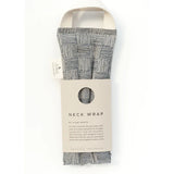 Slow North Hot + Cold Neck Wrap in Haystack, a navy and cream crosshatch wrap with a kraft Neck Wrap sleeve