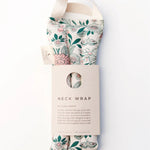 Slow North Hot + Cold Neck Wrap in Hidden Falls, a cream floral wrap with a kraft Neck Wrap sleeve