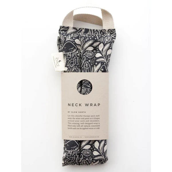 Slow North Hot + Cold Neck Wrap in Mystical Mushroom, a black and cream mushroom print wrap with a kraft sleeve