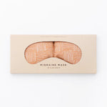 Slow North Migraine Mask in Copper Fields on its kraft packaging card