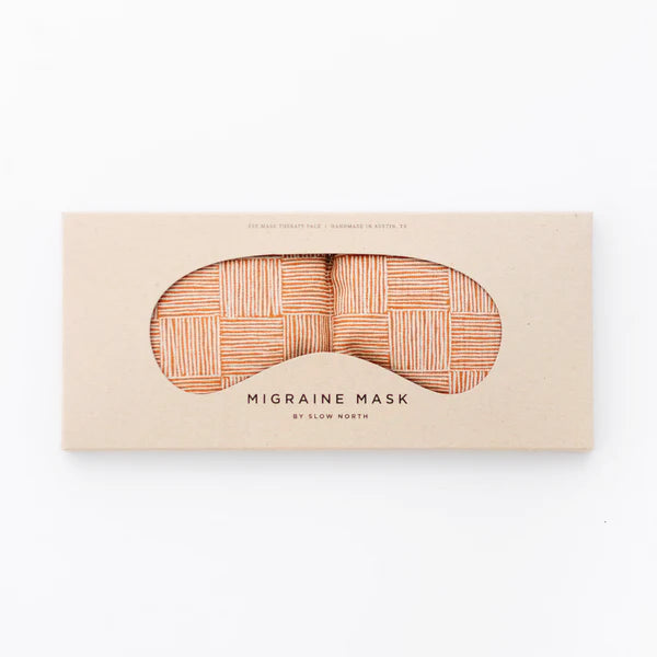 Slow North Migraine Mask in Copper Fields on its kraft packaging card