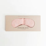 Slow North Migraine Mask in Pink Pampas on its kraft packaging card