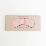 Slow North Migraine Mask in Pink Pampas on its kraft packaging card