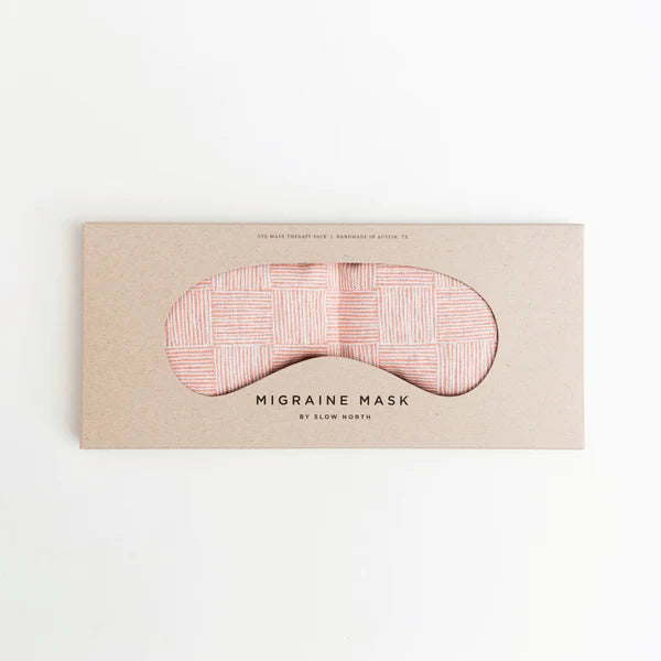 Slow North Migraine Mask in Pink Pampas on its kraft packaging card