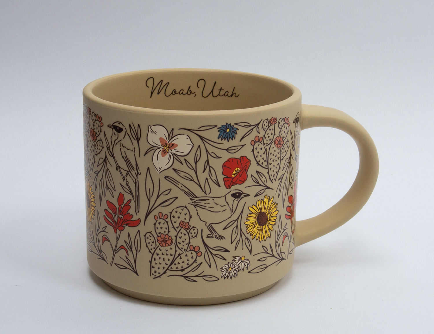 Stackable ceramic Moab mug with desert wildflowers, cacti and birds on a cream base