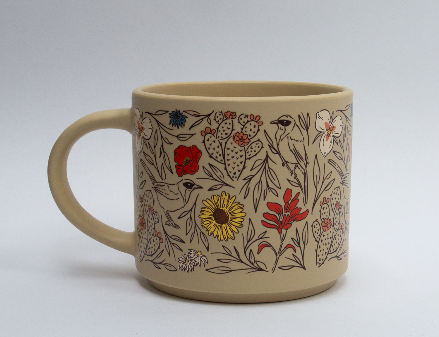 Stackable ceramic Moab mug with desert wildflowers, cacti and birds on a cream base, second view
