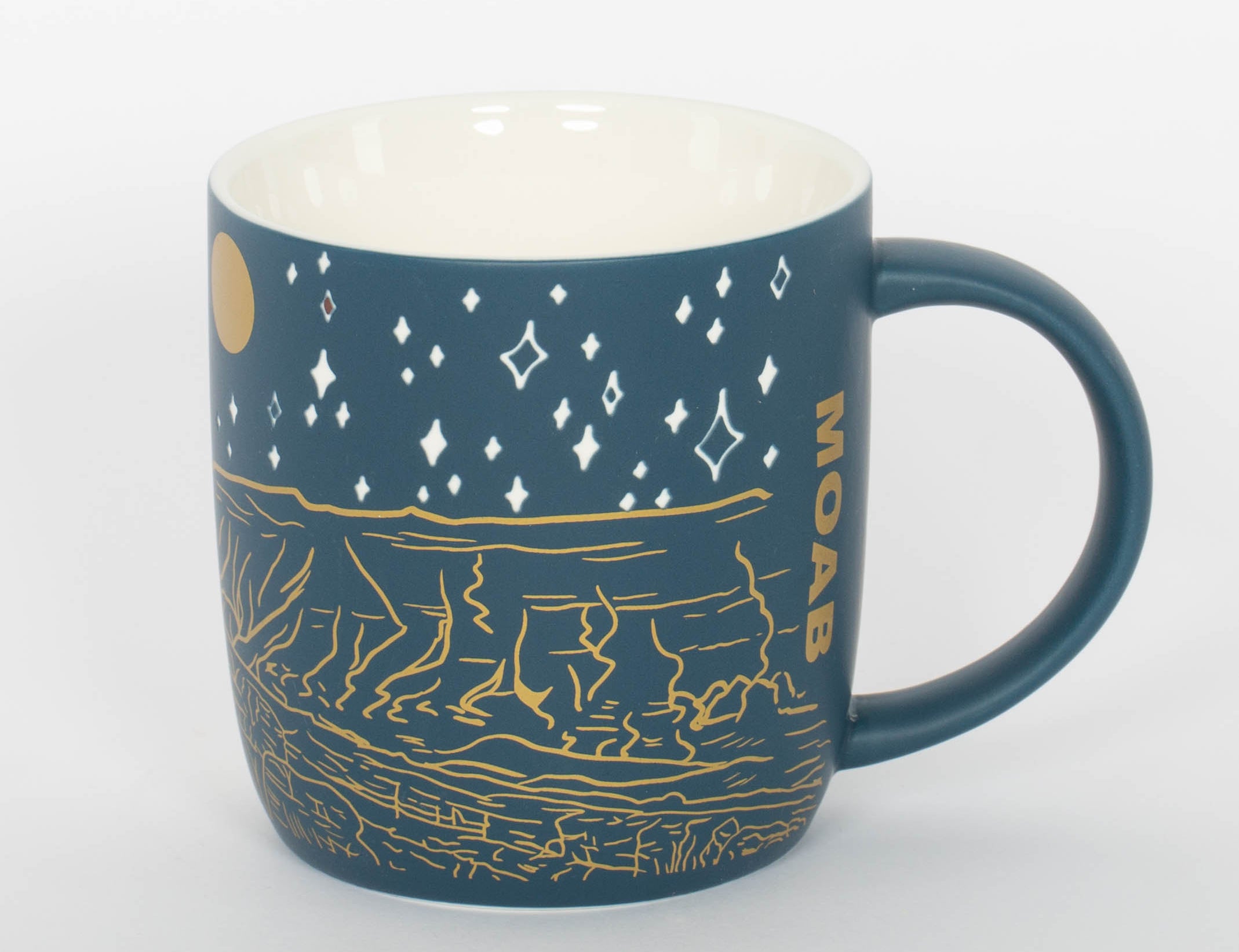 Etched ceramic Moab mug with Delicate Arch on a deep blue night sky, second view